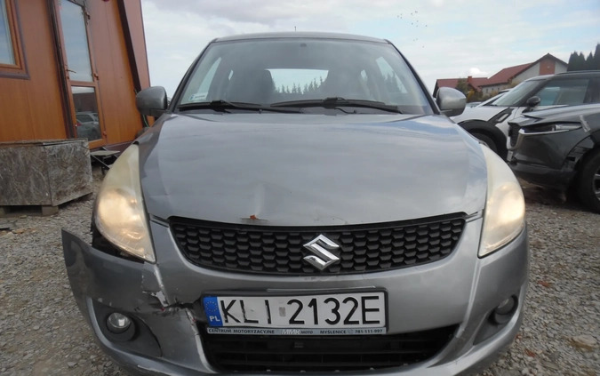 Suzuki Swift cena 9100 przebieg: 133100, rok produkcji 2013 z Olsztynek małe 211